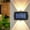 Black140, variant on Iumwxz Solar Powered Outdoor Wall Lights, 2 Pack Modern Up Down Lighting, IP65 Waterproof for Yard Walkway Garden Landscape Security Decor