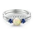 thumbnail image 3 of Gem Stone King 10K White Gold White Ethiopian Opal Blue Created Sapphire and White Lab Grown Diamond 5 Stone Bridal Engagement Wedding Ring Set for Women (0.69 Cttw, Round Cabochon, Size 7), 3 of 6