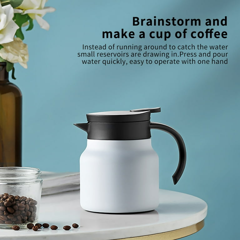 Voluminous marching thermos for hot tea or coffee stands on ground
