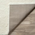 thumbnail image 6 of SAFAVIEH Reno Deacon Solid Polyester Shag Area Rug, Cream, 6'7" x 6'7" Round, 6 of 9