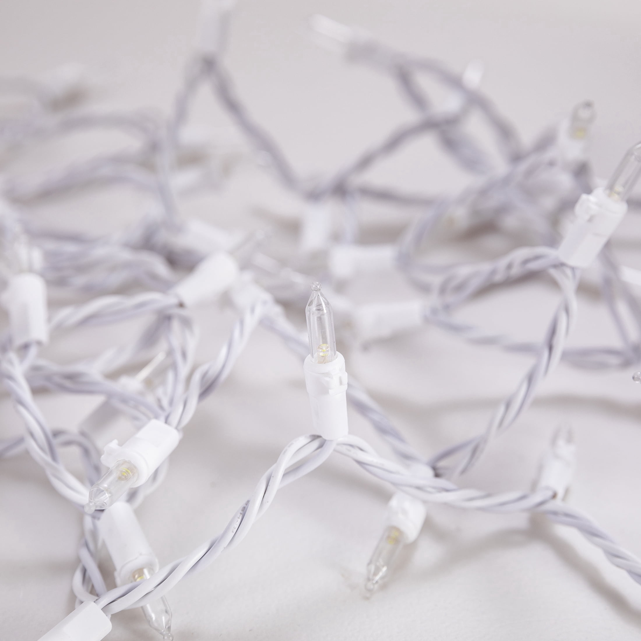 Indoor/Outdoor 50-Count LED Mini Christmas String Lights, Cool White, White Wire, 10.2', by Holiday Time