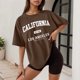 thumbnail image 2 of Camiseta holgada de manga corta y cuello redondo con estampado informal para mujer, 2 of 4