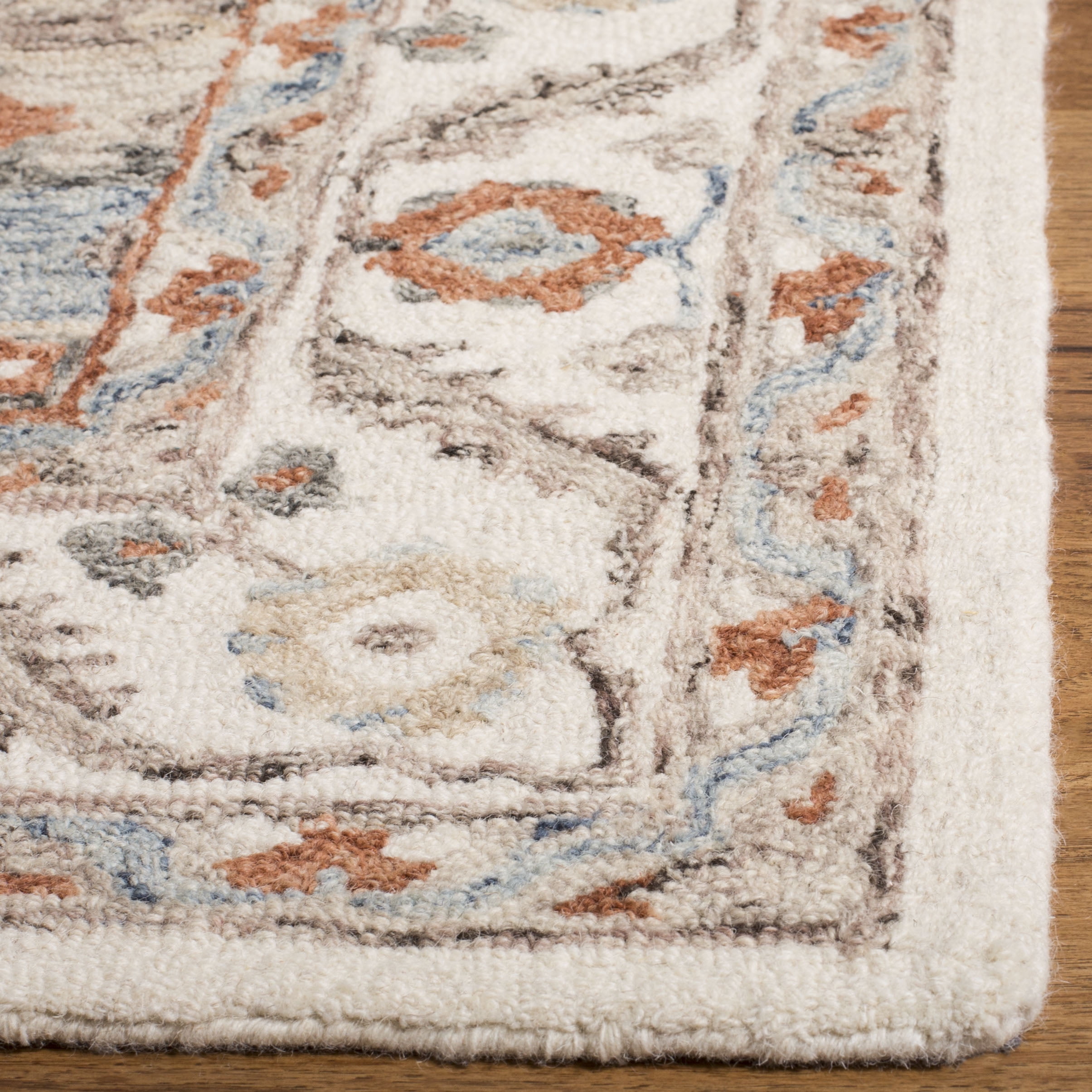 SAFAVIEH Micro-Loop Hypatia Traditional Wool Area Rug, Ivory/Rust, 5' x 8'