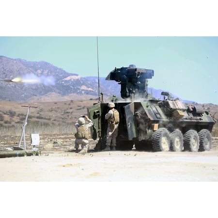 Light Armored Reconnaissance - LAMINATED POSTER Marines serving with Alpha Company, 1st Light Armored Reconnaissance Battalion, fire the anti-tank g Poster Print 24 x 36