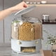 thumbnail image 3 of Cubo de arroz, caja de almacenamiento de granos giratoria para el hogar, a prueba de insectos, recipiente de almacenamiento de fideos de arroz sellado a prueba de humedad, 3 of 5