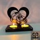 thumbnail image 1 of Innovador candelabro de metal con forma de corazón y anillo para el Día de San Valentín. Atractiva decoración navideña para la mesa con un ambiente iluminador para la decoración festiva de bodas, 1 of 6