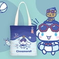 thumbnail image 3 of Hello Kitty-Bolso pequeño de lona para mujer, bolsa de mano Simple de un solo hombro con dibujos animados de Cinnamoroll Kuromiins, 3 of 4