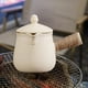 thumbnail image 1 of Tetera de cerámica tradicional con tapa, calentador de leche, tetera de 24 con mango en cuerda para regalos del Día de San Valentín en casa Blanco, 1 of 10