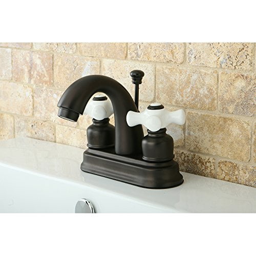 Kingston Brass Restoration Two Handle 4" Centerset Lavatory Faucet with Retail Pop-up