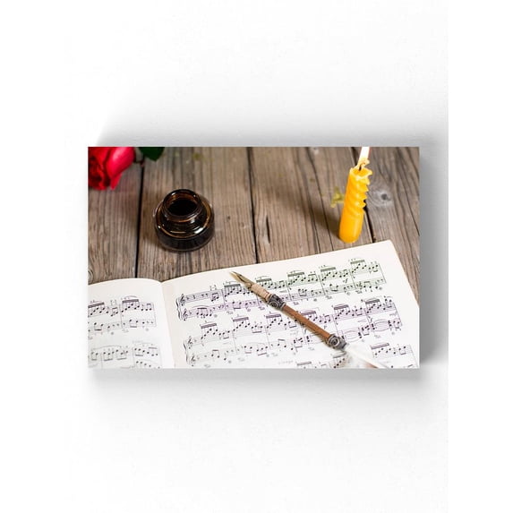 Writing A Score Of Piano Music Wrapped Canvas -Image by Shutterstock,