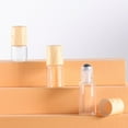 thumbnail image 5 of UDIYO 10Pcs Clear Refillable Glass Empty Roll on Bottles Roller Bottle,Bamboo Roll On Bottle For Essential Oils Perfume Sample Bottles With Stainless Steel Roller Ball &Bamboo Cap(1ML/2ML/3ML/5ML), 5 of 8