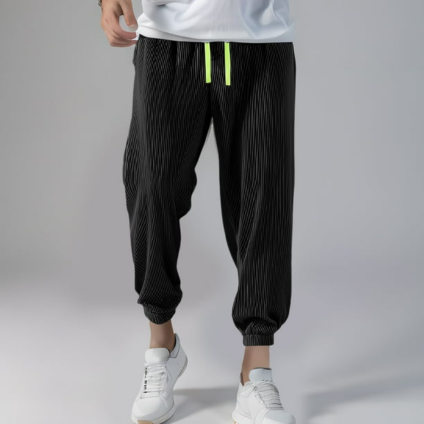 Pantalones largos de moda para hombre, informales, holgados, deportivos, con cinturón elástico y nueve puntos, de poliéster.