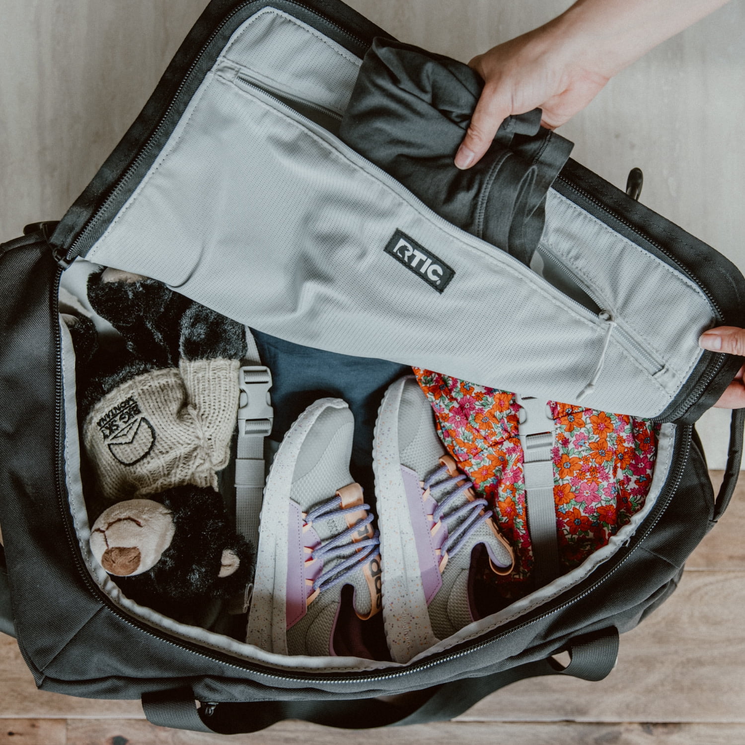 RTIC Road Trip Rolling Duffle Bag, Medium, Water-Resistant and Wheeled, Olive Midnight Camo