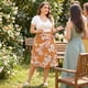 thumbnail image 3 of Faldas envolventes bohemias florales de talla grande para mujeres Agnes Orinda, falda midi con corte en A, dobladillo rizado chic, cintura alta 3X naranja, 3 of 7