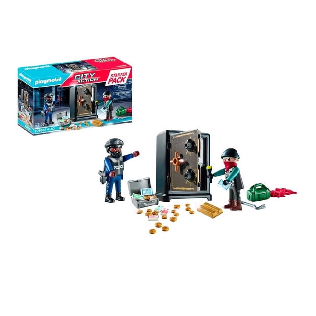 set de juego playmobil action heroes starter pack caja fuerte 53 piezas Starter Pack Playmobil frontal: escena de juego con caja fuerte negra de combinación abierta, rueda y pernos visibles; ladrón con gorro, palanca y maleta verde junto a lingotes, monedas y dos dinamitas; policía de uniforme azul con esposas. Caja del producto a la izquierda sobre fondo blanco; adecuado para juego de construcción y escenas de roles imaginativos.