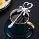 thumbnail image 2 of Billuyoard Mini cucharas en forma de corazón con nudo de lazo, cuchara agitadora de té para postre resistente y duradera, cuchara para postre Mostrada Plata, 2 of 6