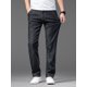 thumbnail image 4 of Pantalones vaqueros rectos finos de verano para hombre, pantalones vaqueros holgados informales elásticos en negro y azul, pantalones de marca para hombre, 4 of 5