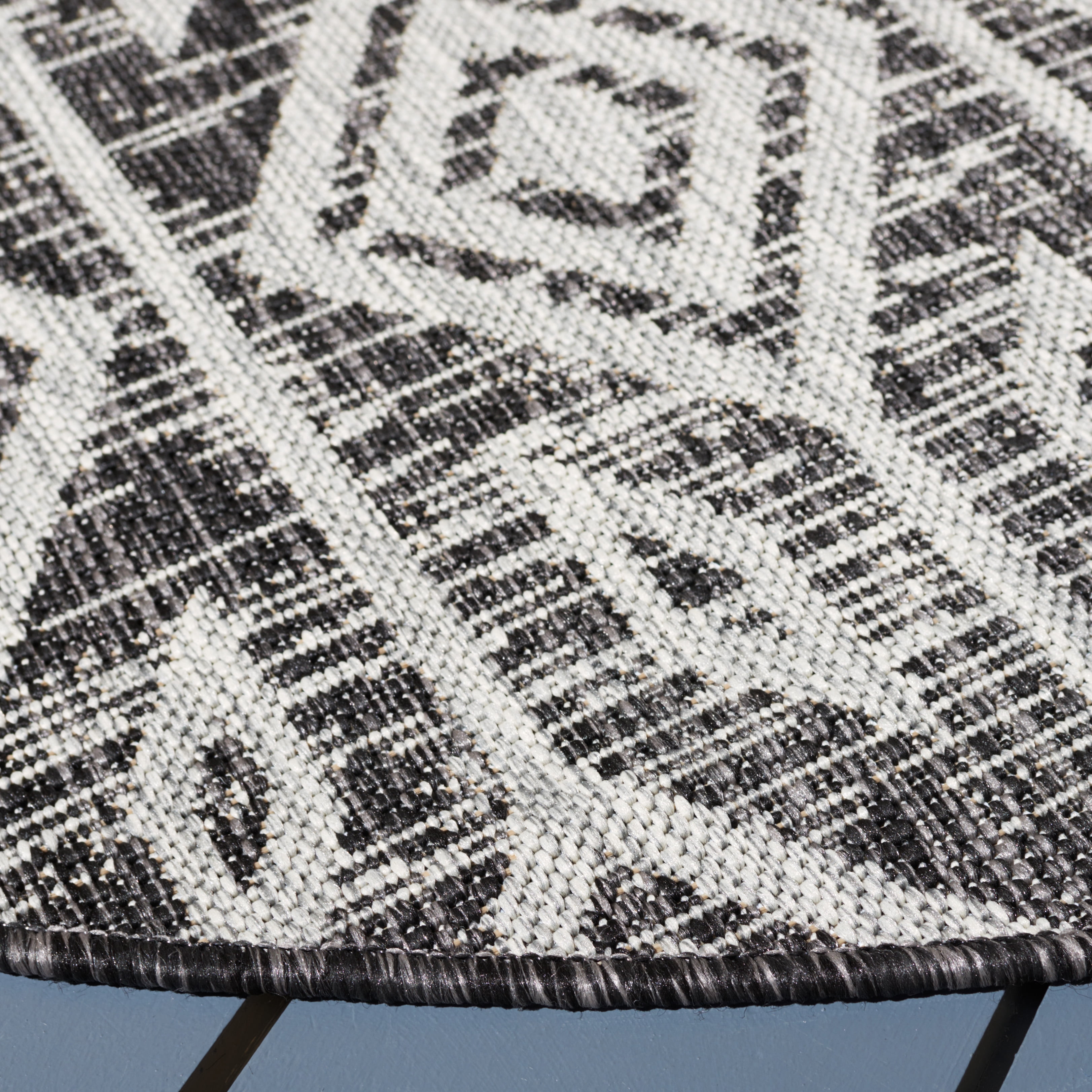 SAFAVIEH Courtyard Beckah Geometric Indoor/Outdoor Area Rug, Black/Grey, 6'7" x 6'7" Round