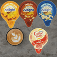 thumbnail image 2 of Coffee Creamer Singles Variety Bundle - 96 Total - 24 French Vanilla, 24 Hazelnut, 24 Caramel Macchiato and 24 Original - Includes a Trademarked Shoppes on the Avenue® Mini-fridge Calendar, 2 of 10
