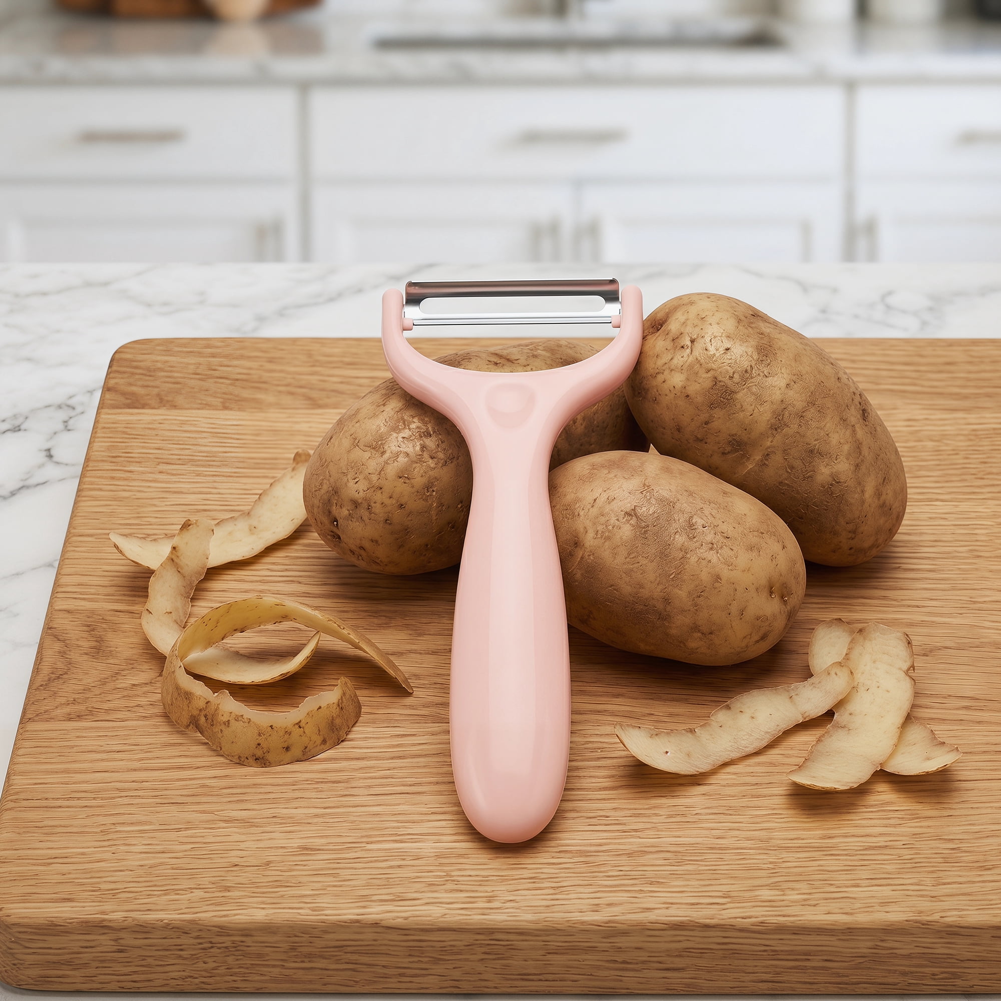 Unique Bargains Plastic Vegetable Peeler with Ergonomic Handle Light Pink 5.9x2.4x0.6 inch