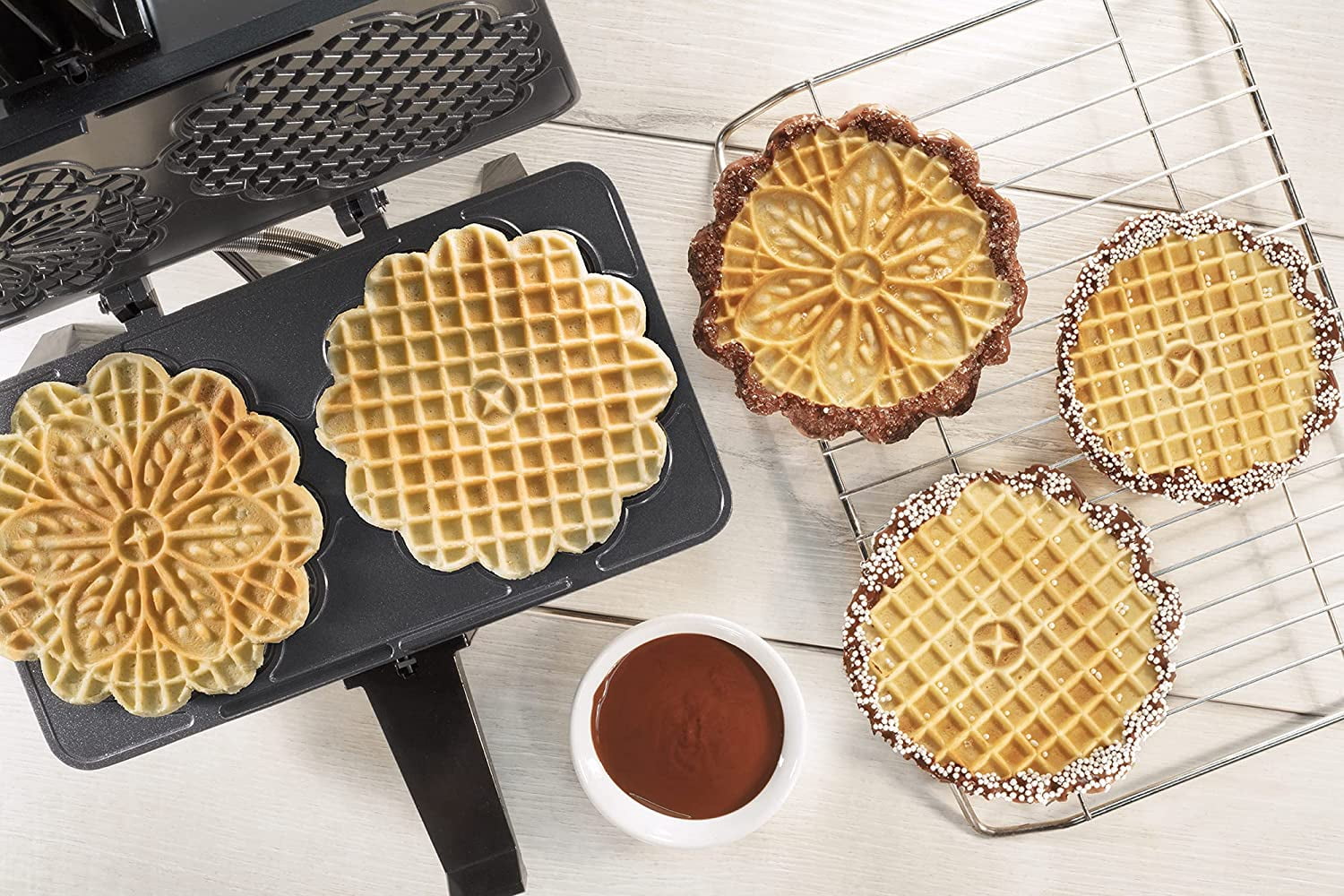 4 waffle cookies with this Pizzelle Maker non-stick, electric