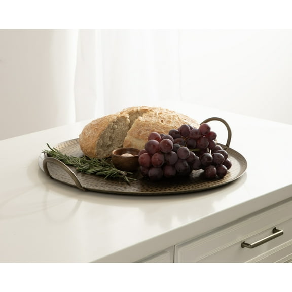 Kate and Laurel Sanzo Transitional Hammered Metal Round Tray, 16 Inch Diameter, Antique Brass, Vintage Metal Decorative Circle Tray with Hammered Surface and Minimalist Metal Handles