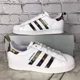 thumbnail image 1 of Ad-id-as Original SuperStar Men’s 3 Stripe Camouflage Low Top Shell Toe Sneakers, 1 of 6