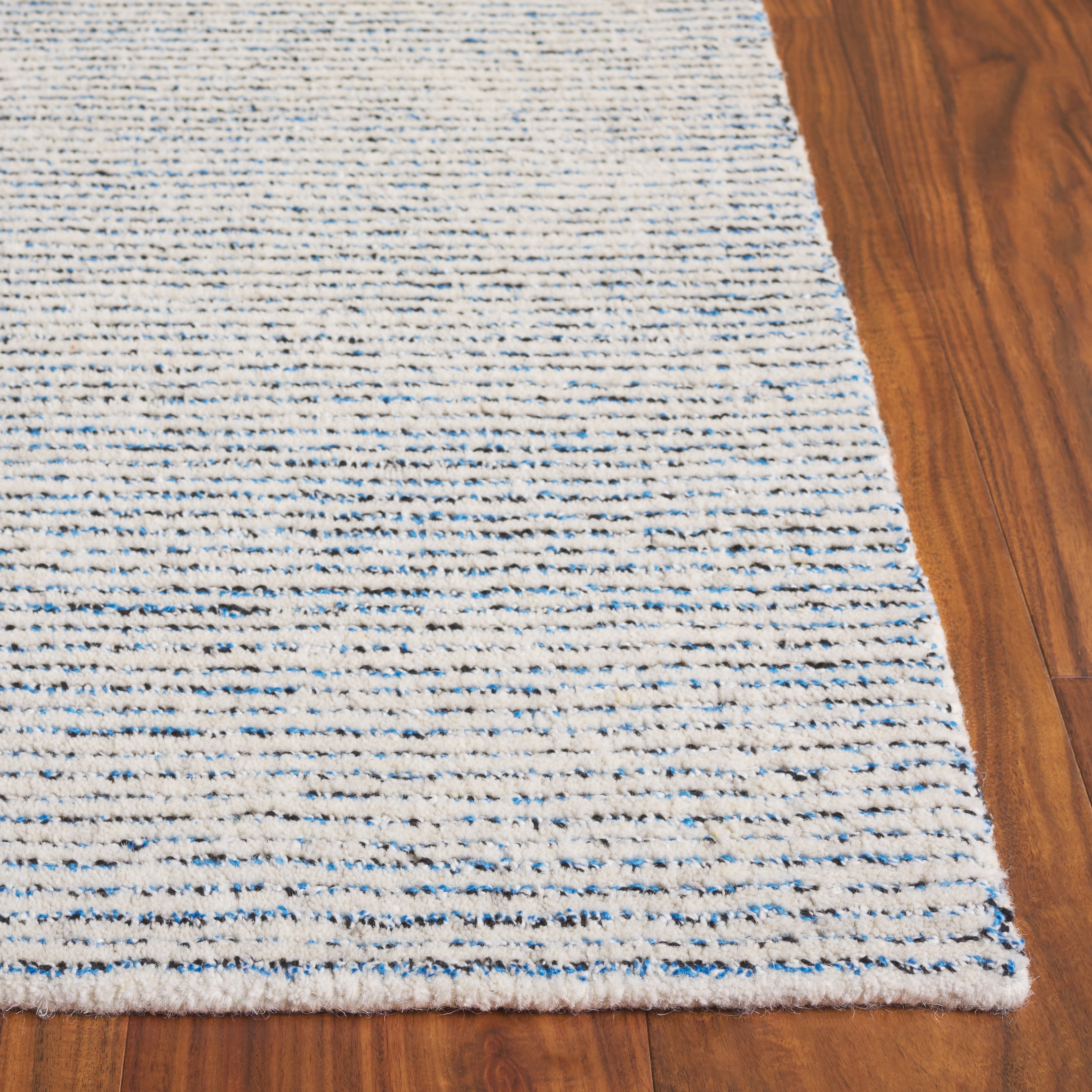 SAFAVIEH Abstract Rumen Solid Color Area Rug, Blue/Black, 3' x 5'
