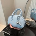 thumbnail image 1 of Bolso pequeño y redondo de diseño de nicho de alto valor para mujer, nuevo bolso bandolera versátil de moda 2025., 1 of 5