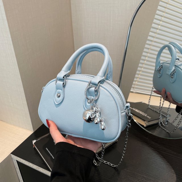 Bolso pequeño y redondo de diseño de nicho de alto valor para mujer, nuevo bolso bandolera versátil de moda 2025.