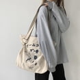 thumbnail image 1 of Bolso de hombro de lona grande Nikou para mujer, 1 of 9
