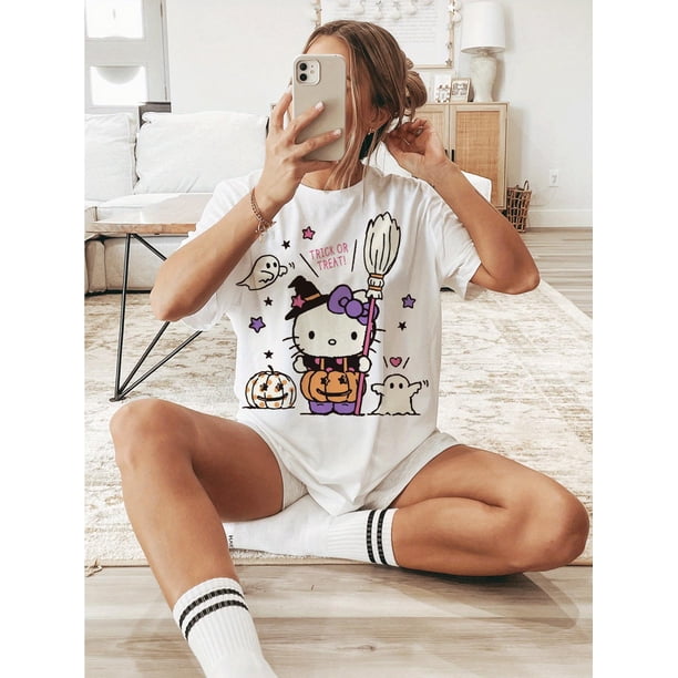 Halloween T-Shirt - Hello Kitty Halloween "Trick or Treat" Graphic T-Shirt for Women - White Short Sleeve Crew Neck Casual Top with Pumpkins, Ghosts & Stars for Summer & Spring