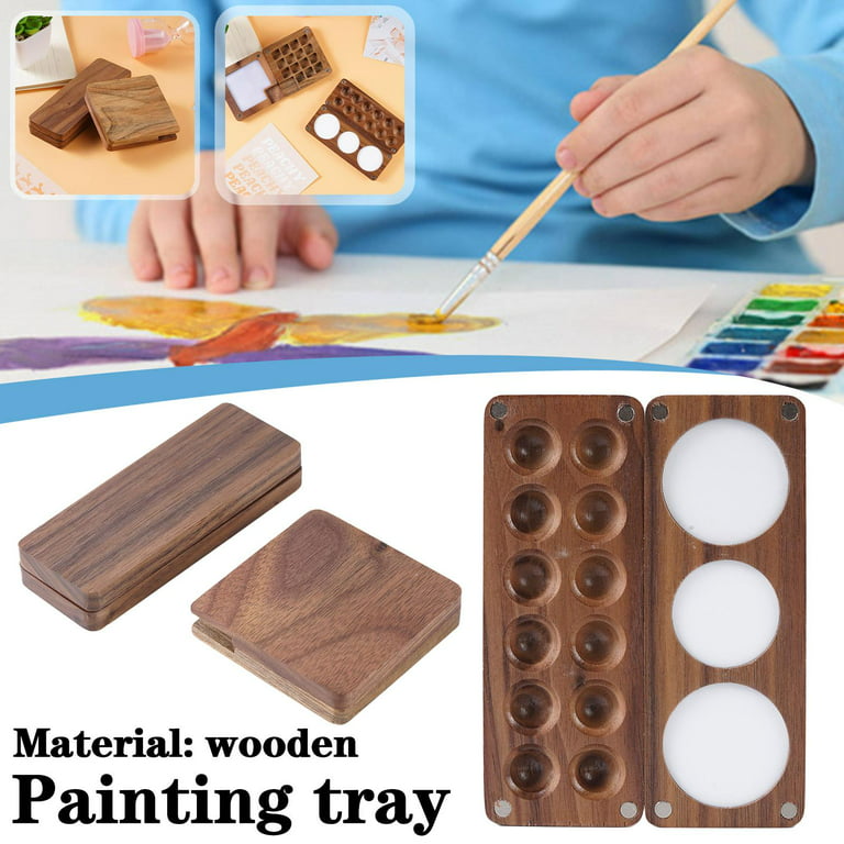 Artist Paint Brushes,chalks and Watercolor Paintbox on Wooden