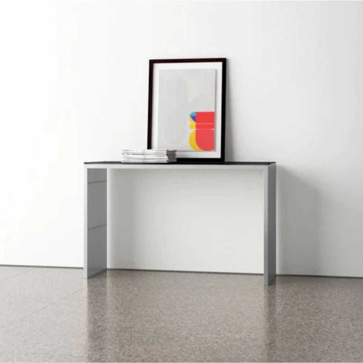 Deanna Slate Console Table made of stainless steel with clear glass top