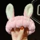 thumbnail image 1 of Una diadema con orejas de conejo rosa para lavar o maquillar., 1 of 5