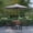 Gray, variant on Merrick Lane Teal 9' Round UV Resistant Outdoor Patio Umbrella With Height Lever And 33° Push Button Tilt