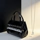 thumbnail image 1 of Bolso de mano para guardar piano con gran capacidad y exquisito bolso de mano de poliuretano para mujer con un solo hombro., 1 of 6