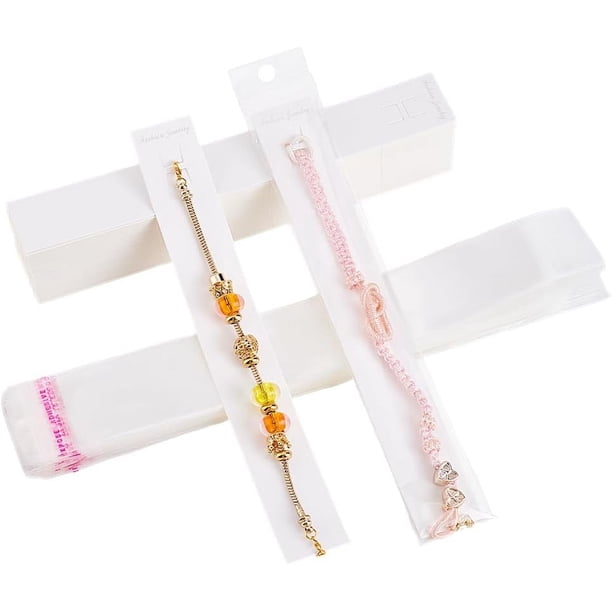 100 tarjetas blancas para exhibir pulseras, de 8,2 x 1,1 pulgadas, para collares y joyas, con bolsas de polipropileno.