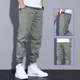 thumbnail image 2 of Pantalones cargo holgados y modernos con frunces, pantalones casuales recortados a la moda para hombres, tendencia juvenil de primavera y otoño, color sólido, 2 of 5