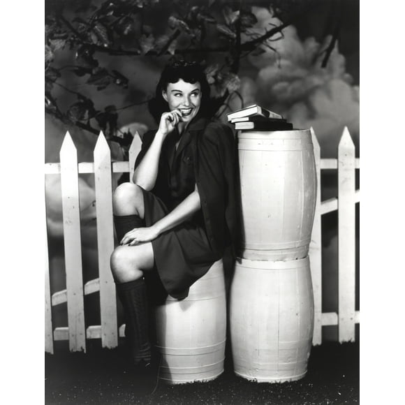 Paulette Goddard Posed with Barrels Photo Print (24 x 30)