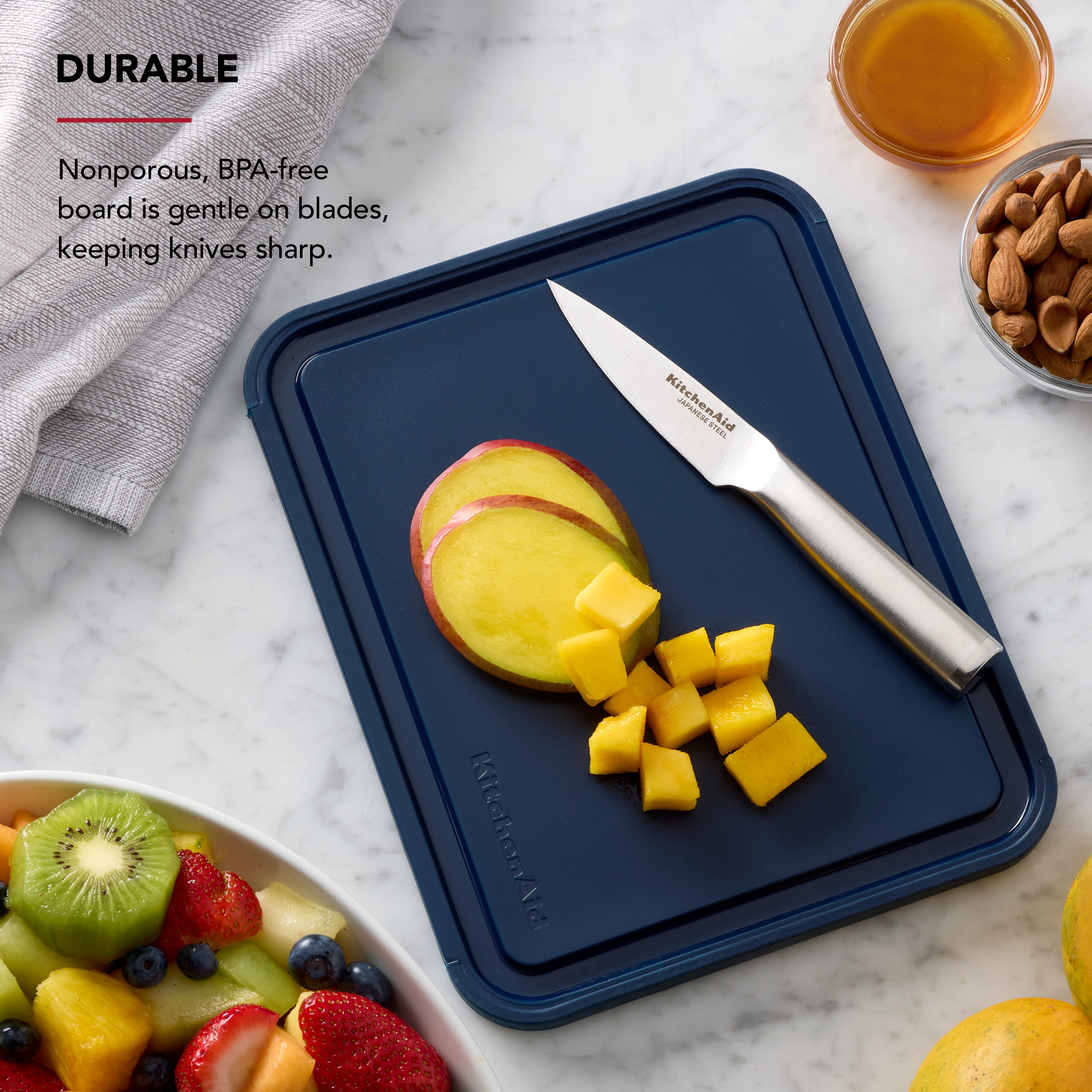 KitchenAid Classic Plastic Cutting Board with Trench, Non-Slip Edges, Dishwasher Safe, 8x10, Ink Blue