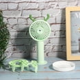 thumbnail image 2 of Miniventilador portátil de mano con dibujos animados en color verde, apto para niños, con USB, para exteriores, con función de burbujas, 2 of 8