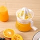 thumbnail image 5 of Exprimidor manual de cítricos | Exprimidor de mano para limón y naranja con vaso medidor y rallador integrados | Diseño ligero y portátil de plástico | Extractor de frutas fácil de limpiar para, 5 of 8
