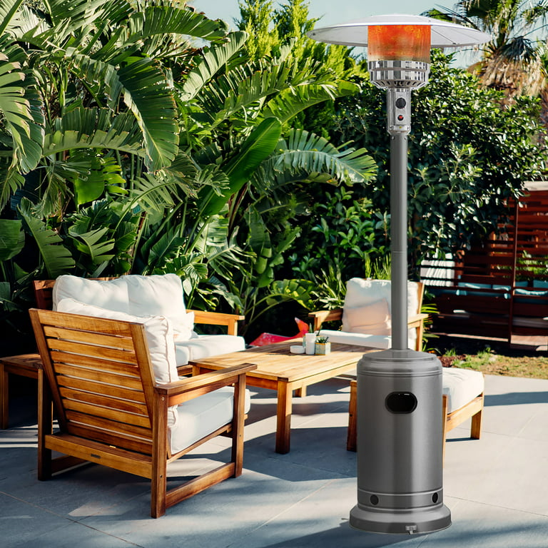 Patio heater in a garden seating area.