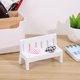 thumbnail image 2 of Juego de 3 bancos de jardín dobles de madera blanca en miniatura para porche, ideales para decoración del hogar o como accesorios para fotomatón (una silla + dos tapetes)., 2 of 7
