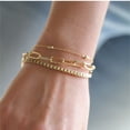 thumbnail image 3 of Set de cuatro pulseras doradas CYRA, 3 of 3