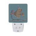 thumbnail image 2 of Cute Capybara Rides Sleigh with Christmas Gifts LED Night Light Sensor Lamp Plug-in Adjustable Brightness 2 Pack, 2 of 7