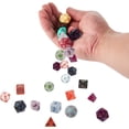 thumbnail image 4 of Brybelly GDIC-1172 Winters Dawn Solid Blue with Pink Paint Dice, Set of 7, 4 of 6