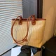 thumbnail image 4 of Bolso tejido de paja versátil de gran capacidad para mujer, nuevo bolso de playa tejido de estilo extranjero de moda informal de 2024, bolso de viaje para el trabajo, 4 of 5