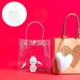 thumbnail image 2 of EeaseMX 12 bolsas de regalo reutilizables transparentes de plástico para envolver regalos., 2 of 8